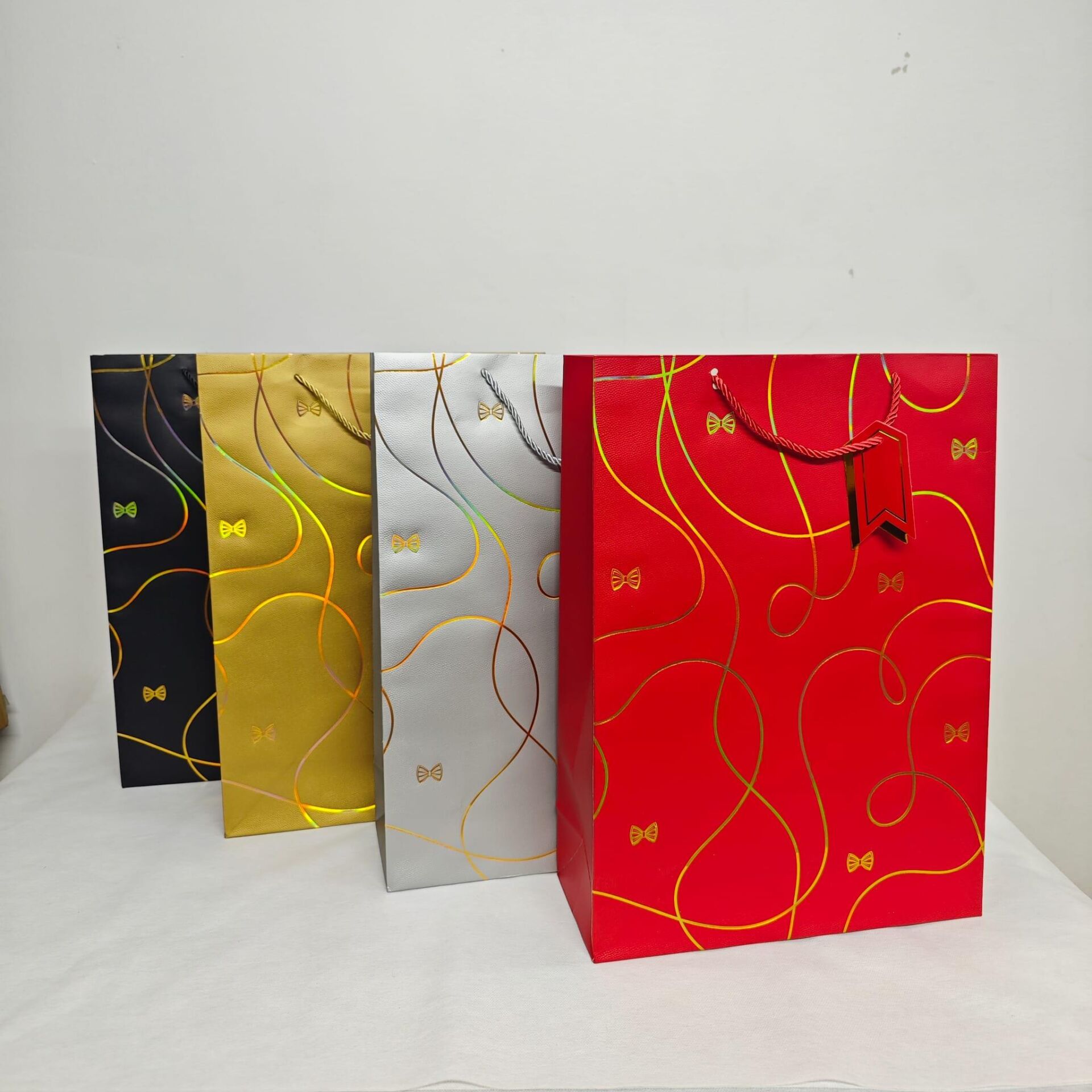 ÇANTA İP SAPLI İTHAL LÜKS PAPYONLU 30*12*41 12 Lİ